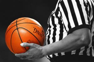 Referee Holding Basketball